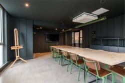 Dark green corporate boardroom design for London office fit out project.