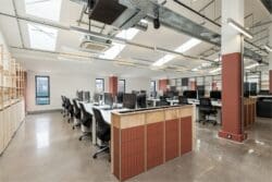 Open plan office with polished concrete floor in London office fit out project.