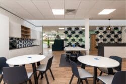 Dining furniture in office breakout space for office interior design project.