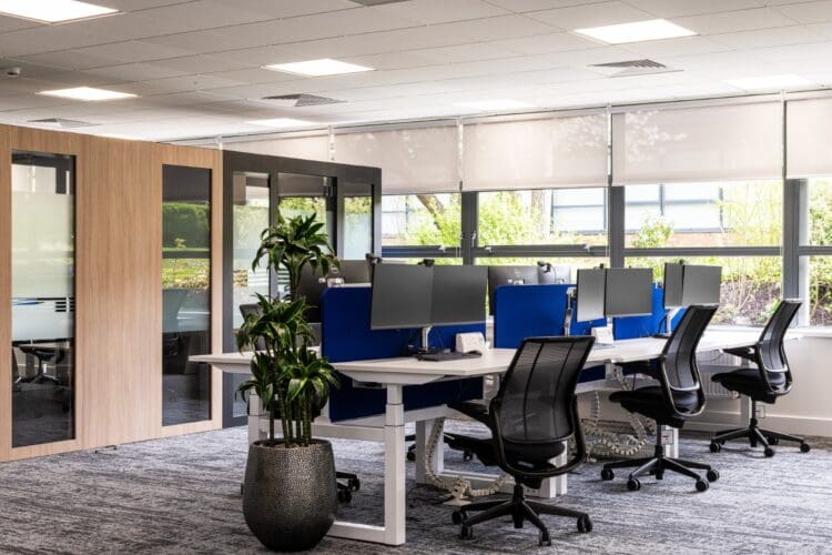 Modern office furniture solutions and meeting booths.