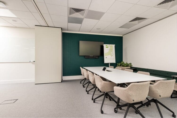 Modern office boardroom with open operable door.