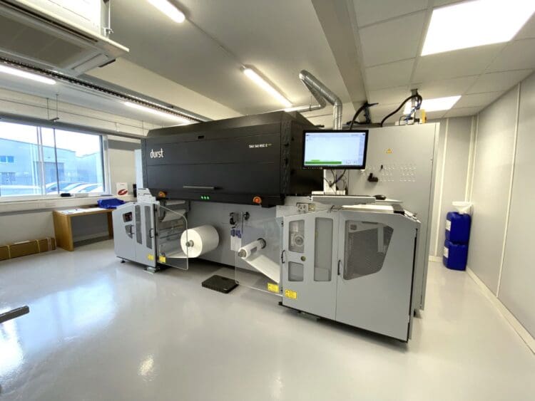 Label Express printing press machine room in industrial refurbishment project.