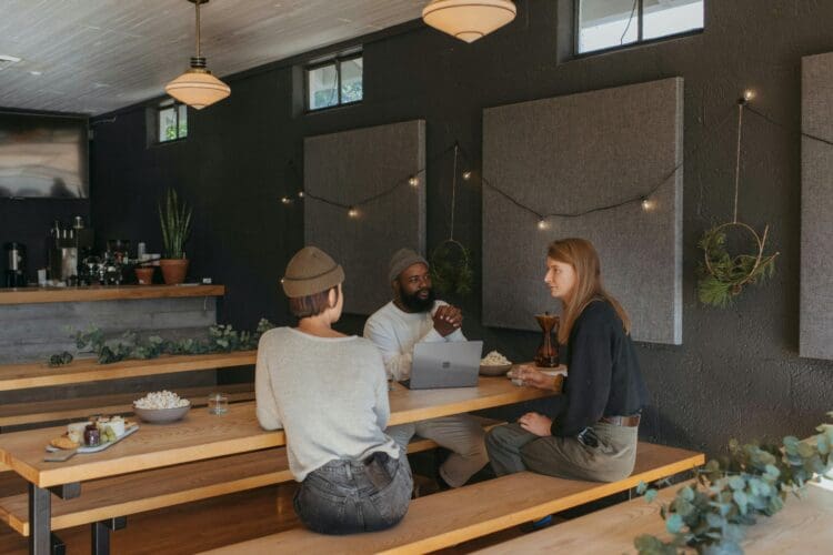 Office breakout space in coworking office design for staff to relax and collaborate.