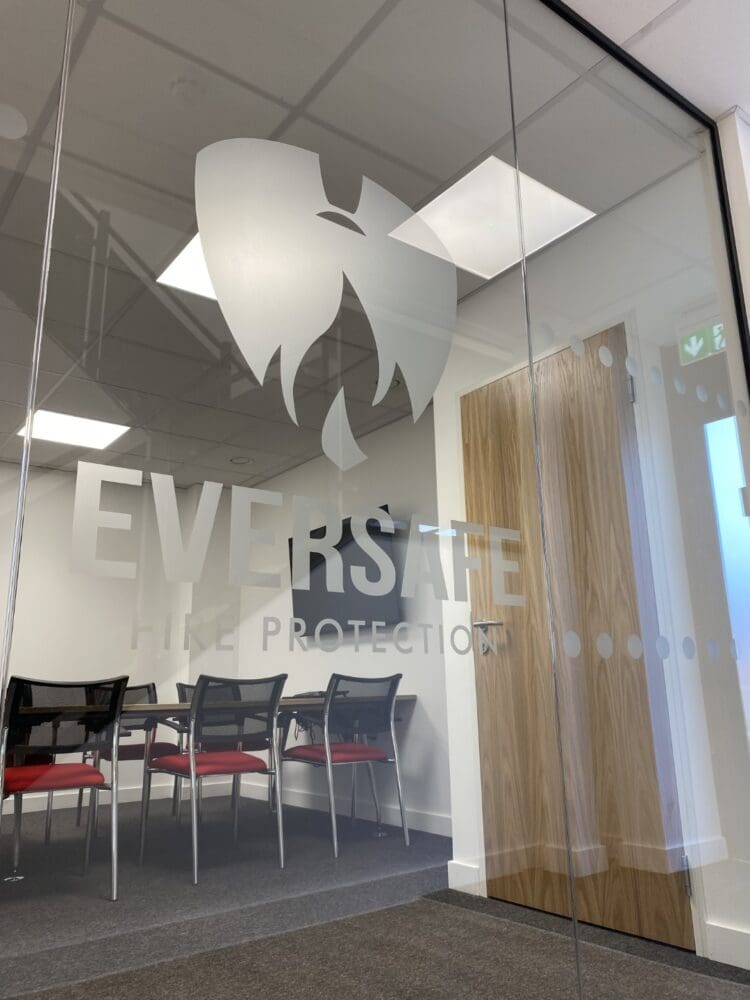randed manifestation on glazed boardroom in industrial fit out project in Kent.
