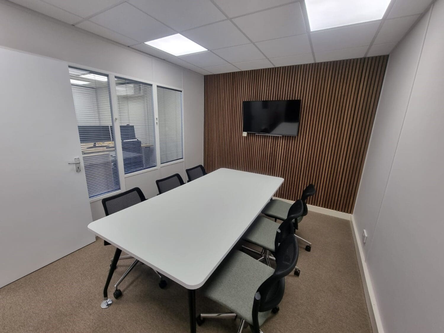 Corporate office boardroom for office refurbishment in Sussex.