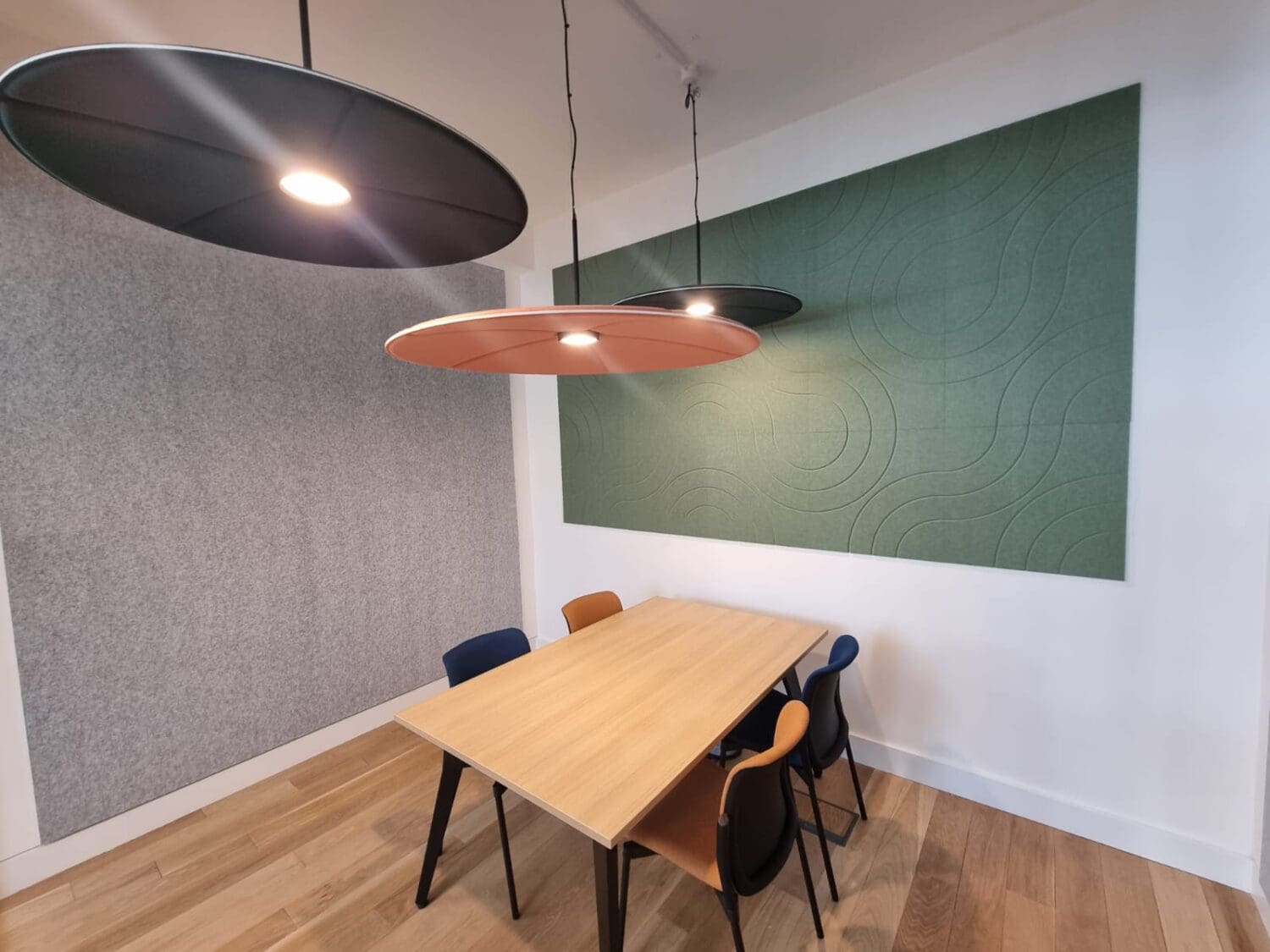 London office meeting room with acoustic pendant light fittings.