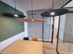 Modern London office refurbishment with meeting room design and feature acoustic pendant lighting.