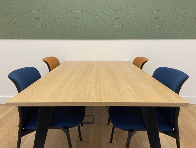Timber effect meeting table and soft seating for London office refurbishment project.