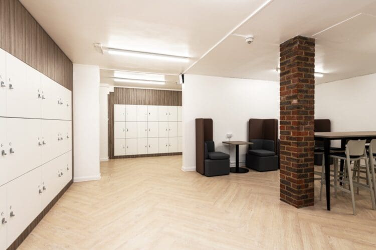 Modern sixth form common room design with practical furniture solutions in London school refurbishment project.