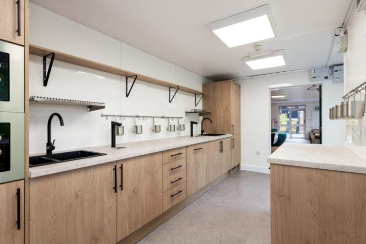 Modern student tea point in school refurbishment project at Jags, London.