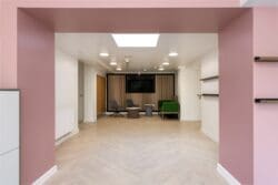 School entrance hall refurbishment with blush pink feature archway.