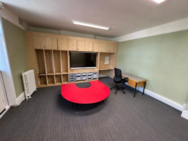 Classroom design and refurbishment with bespoke media wall.
