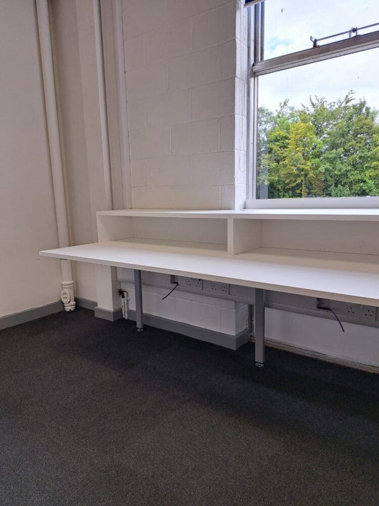 Bespoke school furniture for music classroom desking by Rap Interiors.