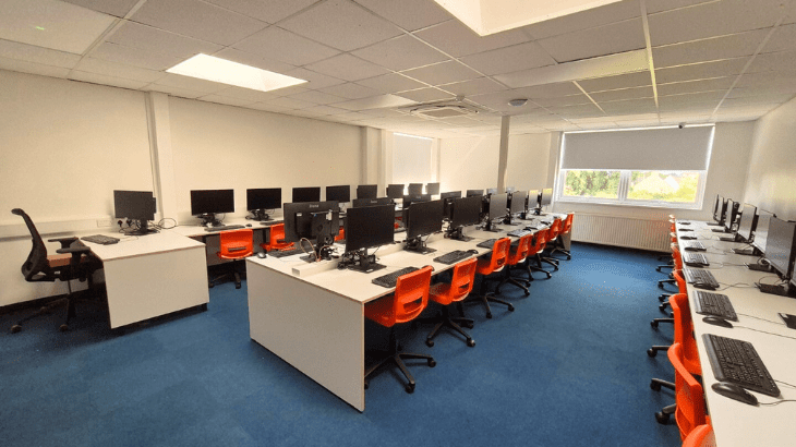 IT classroom design with bespoke furniture solutions for education.