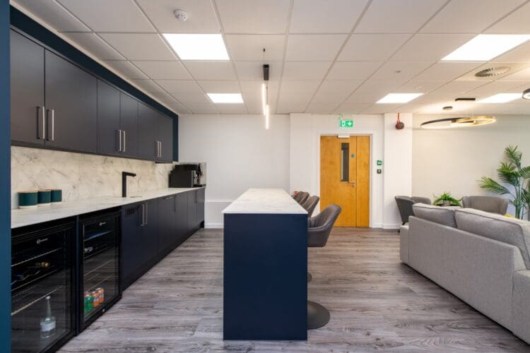 Office tea point client entertainment space with modern bar.