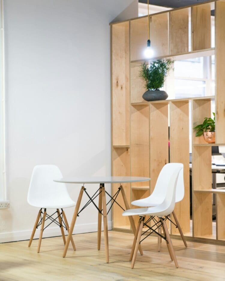 Scandi office design with natural materials and muted colours.