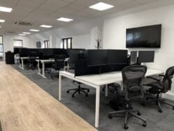 Modern office refurbishment with open plan desking.