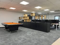 Office refurbishment project with staff breakout space and modern finishes.