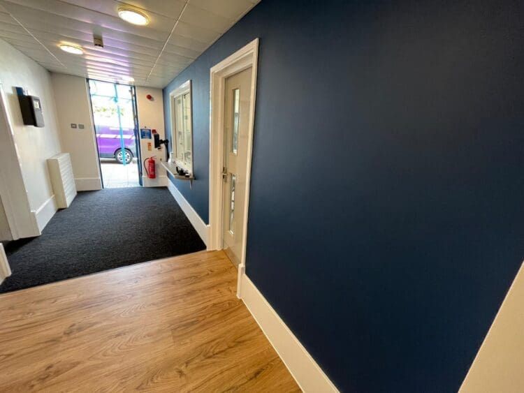 School reception area refurbishment with branded colour scheme.