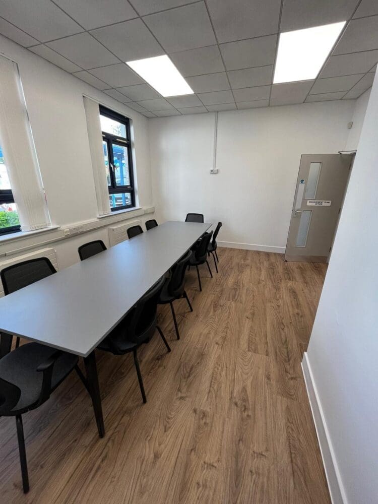 Staff meeting area in school refurbishment project with modern furniture solutions.