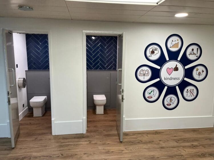 School washroom refurbishment with modern finishes and branded colour scheme