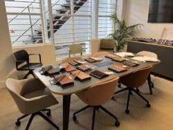 Modern office furniture design for boardroom and meeting room refurbishments at Pledge showroom.