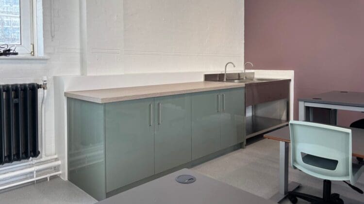 Art classroom refurbishment with modern sink and storage units.