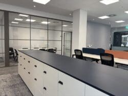 Modern office storage solutions in London office interior design.