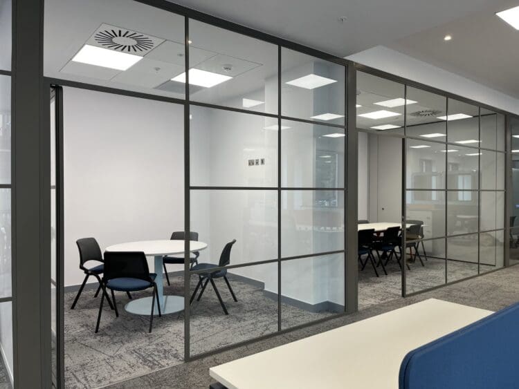 Office meeting room design with crittal glass partition.