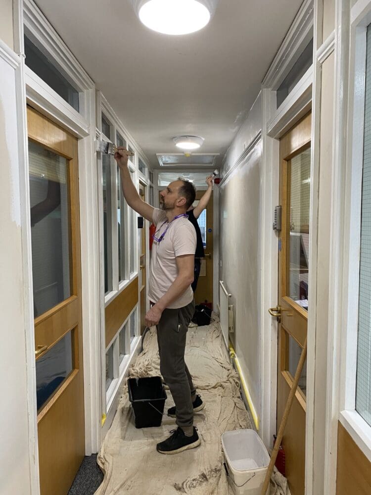 Rap Interiors volunteer to decorate office corridors at the Heart of Kent Hospice