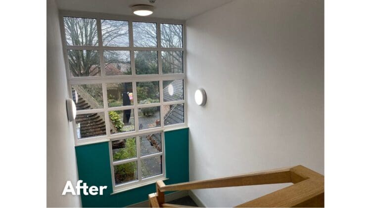 Refurbished stairwell by the a team volunteering from Rap Interiors and JD Bush