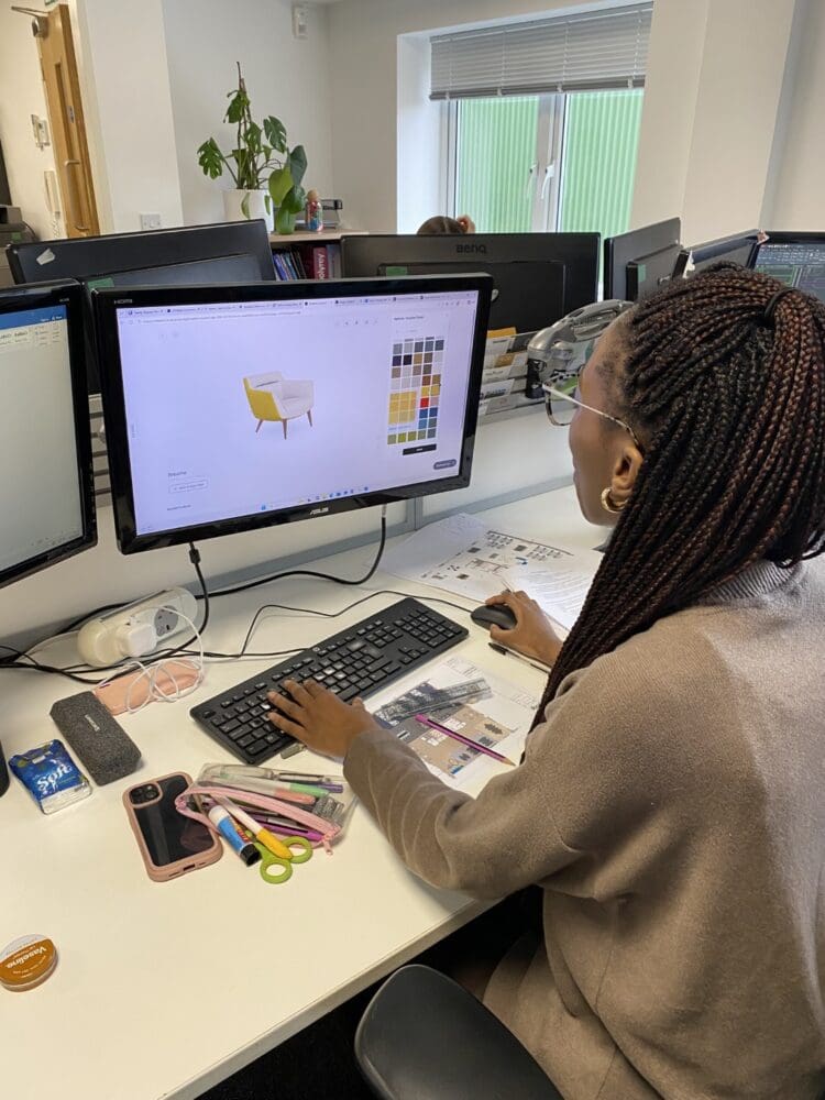 Work experience student creating an office interior design project.