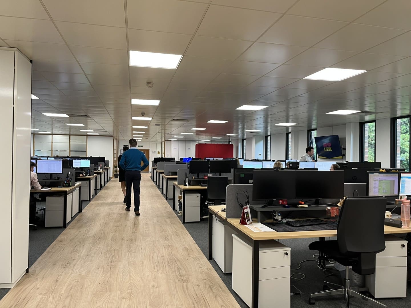 Office refurbishment with timber LVT flooring and furniture solutions.