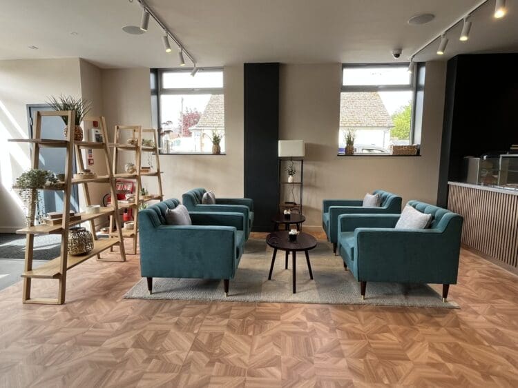 Coffee shop interior design scheme with soft seating.