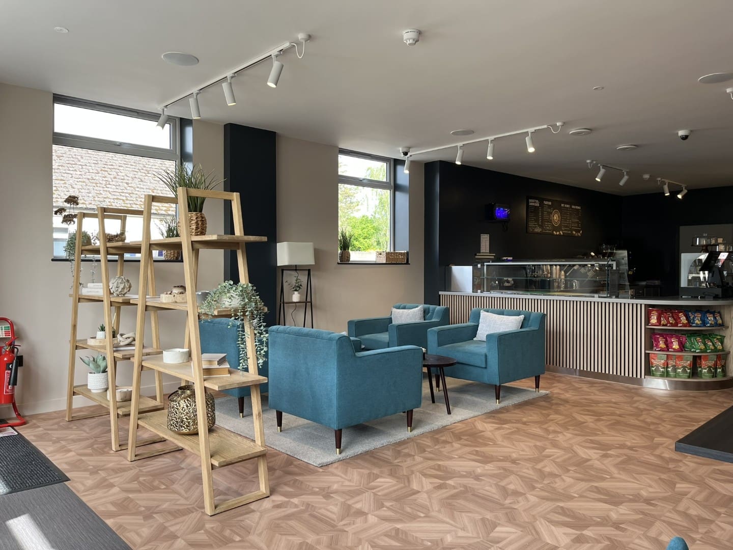 Coffee shop interior design scheme with soft seating area Kent