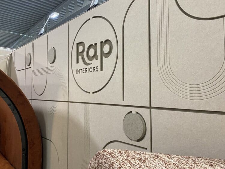 Rap Interiors branded acoustic wall panels on exhibition stand.