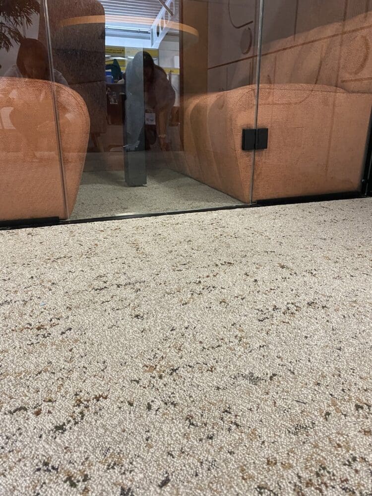 Understated carpet tile by Shaw Contract for Rap Interiors exhibition stand.